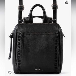 The Sak Loyola mini backpack purse. Black leather with adjustable straps.